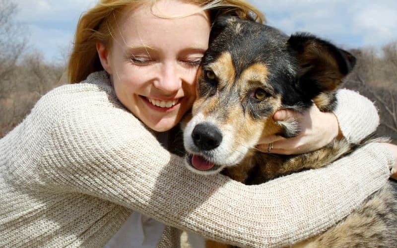Dog-Joint-Care-Woman-Hugging-Dog-Min
